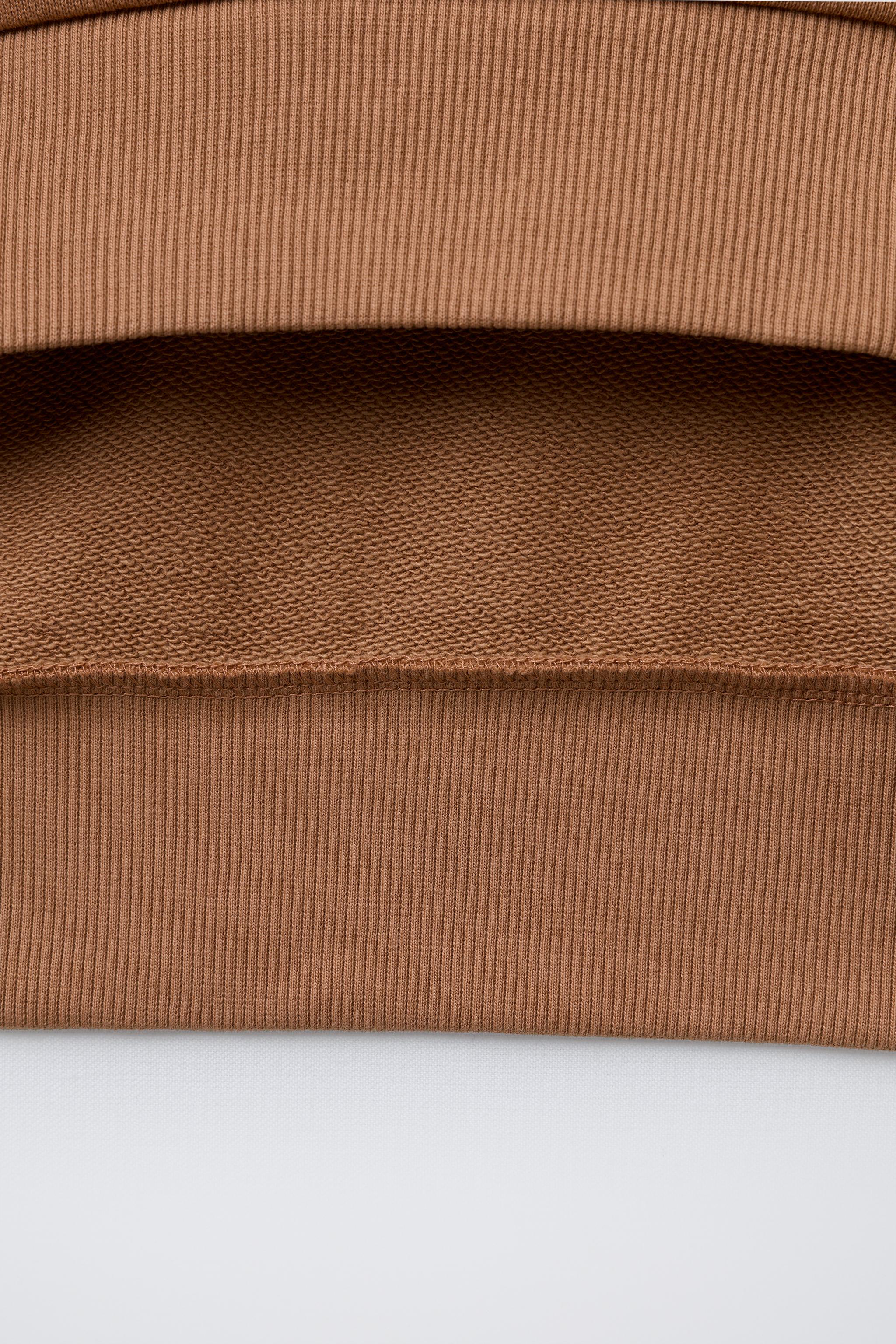 PLAIN SWEATSHIRT WITH RAISED TEXT